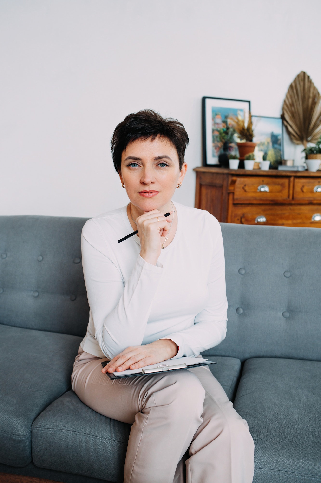 Psychologist listens attentively to a client in his office